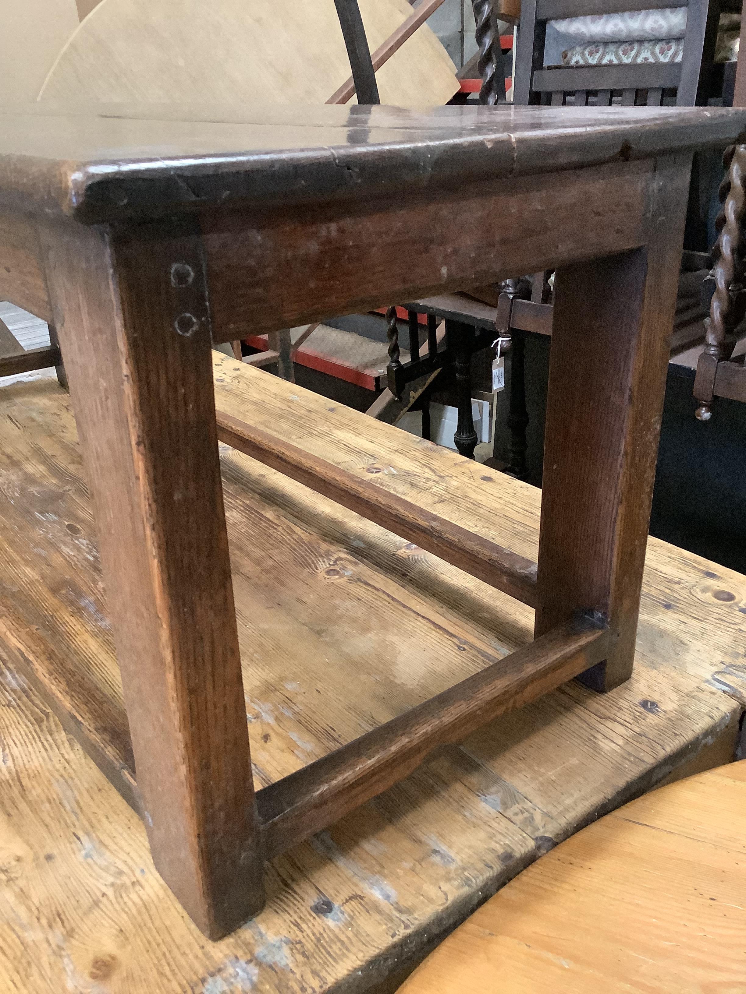 An 18th century style rectangular oak low table, width 126cm, depth 47cm, height 46cm